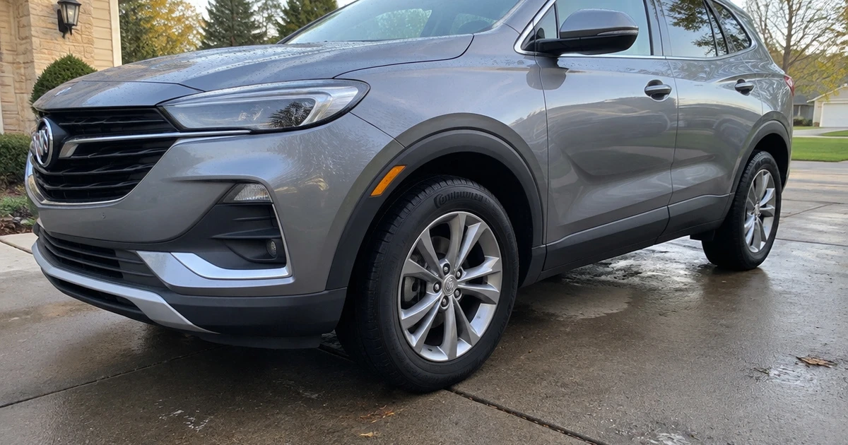 A Buick Encore GX parked on a driveway with tires for Buick Encore GX fitted