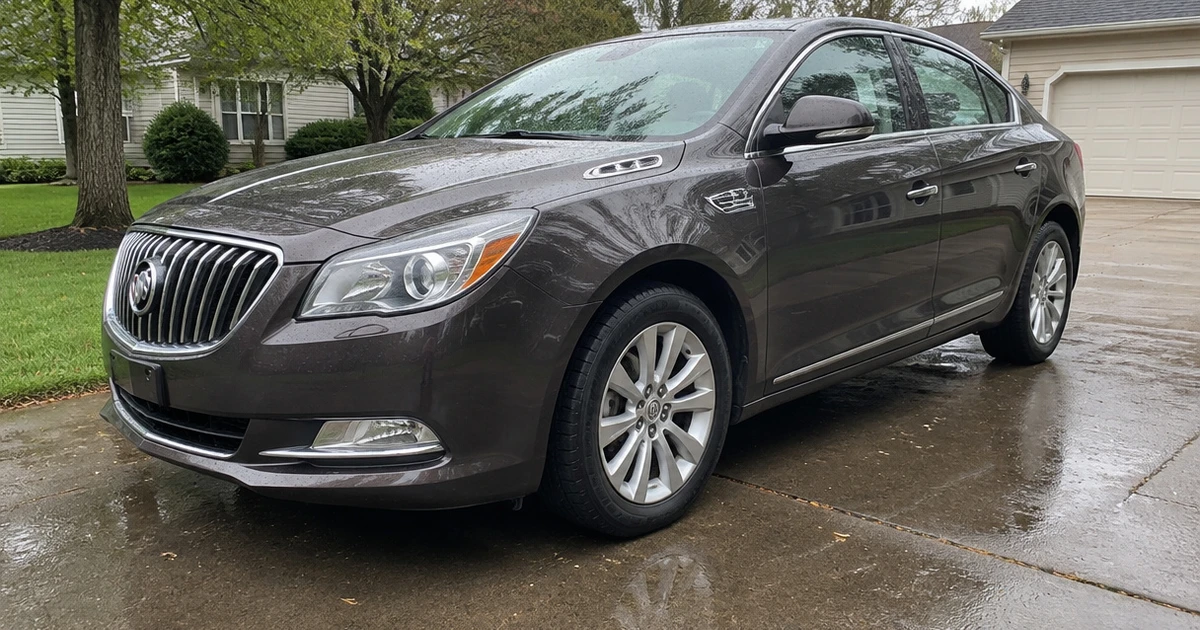 A Buick LaCrosse sedan sits on a street with its tires for Buick LaCrosse clearly visible