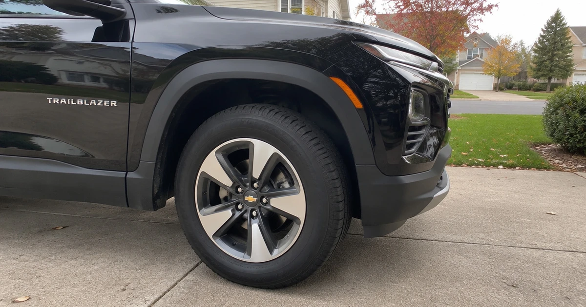 Fresh tires for chevy trailblazer sit mounted on a vehicle in a sunny driveway