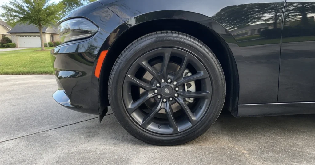 A single mounted tire on a Dodge Charger shows tires for Dodge Charger in everyday use