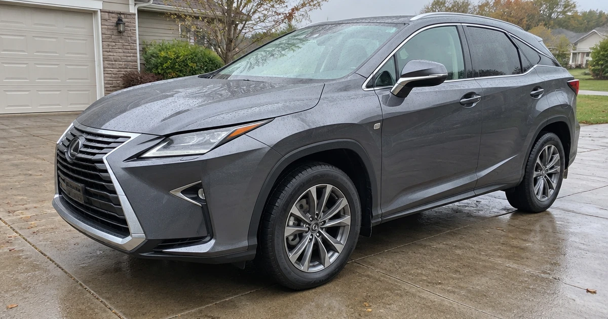 A Lexus RX parked outside shows tires for Lexus RX fitted on its wheels