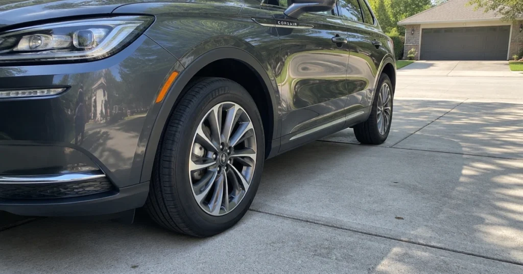 Tires for Lincoln Corsair fitted to a parked SUV on a quiet driveway