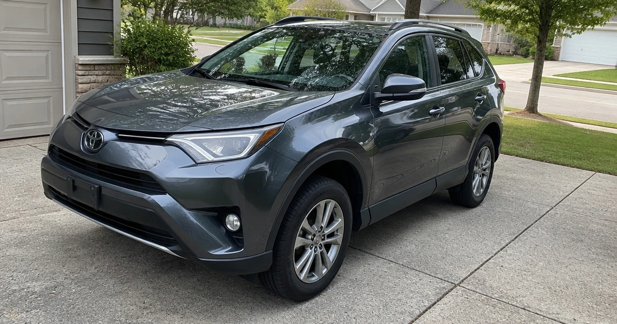All-season Tires for Toyota RAV4 fitted on a parked SUV in a driveway